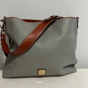 Dooney and Bourne large shoulder bag in smoke gray. Never used.